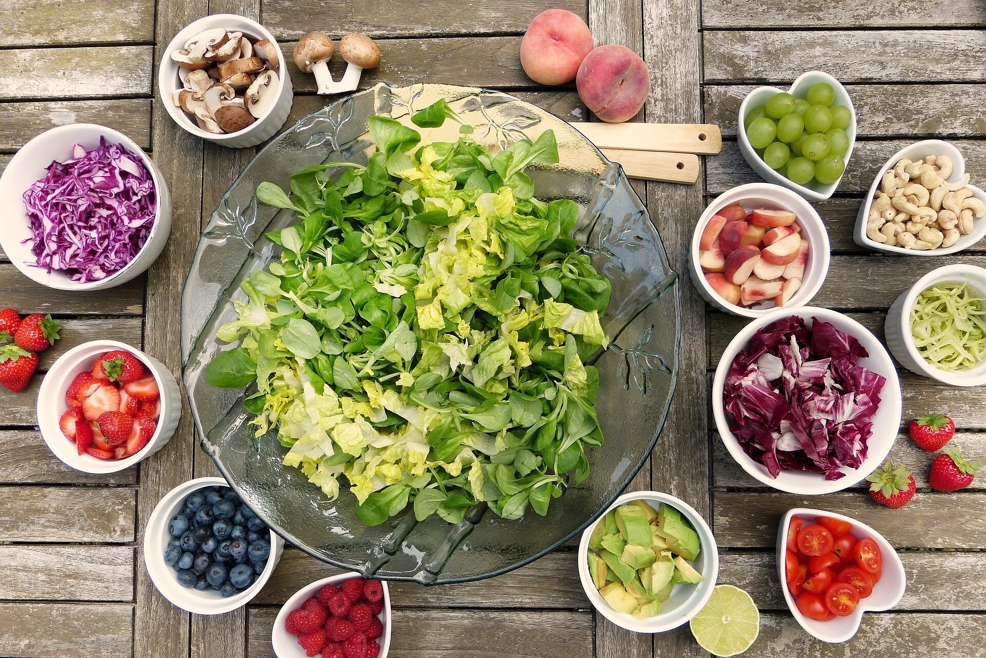 Assortment of fruits and vegetables on a wooden tabletop